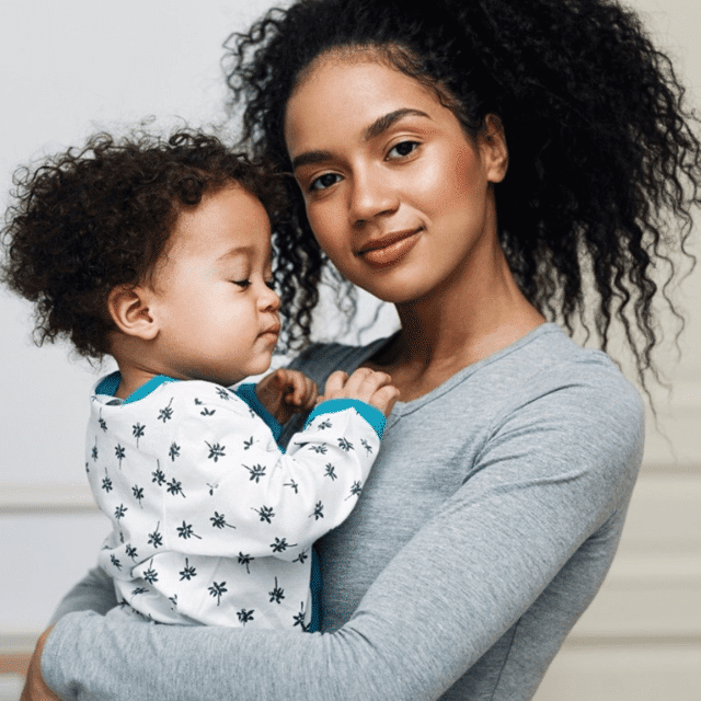 Family Connections: a woman holding her baby