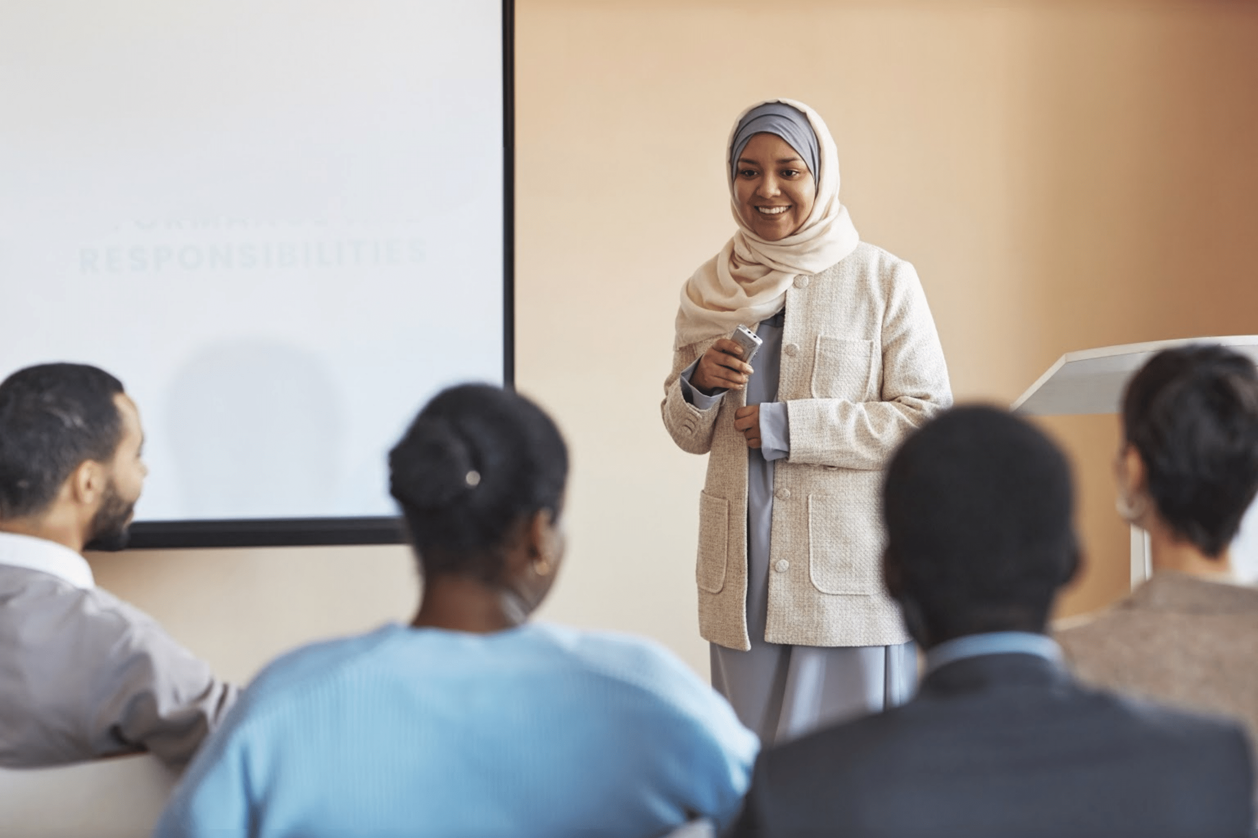 A woman leads a seminar
