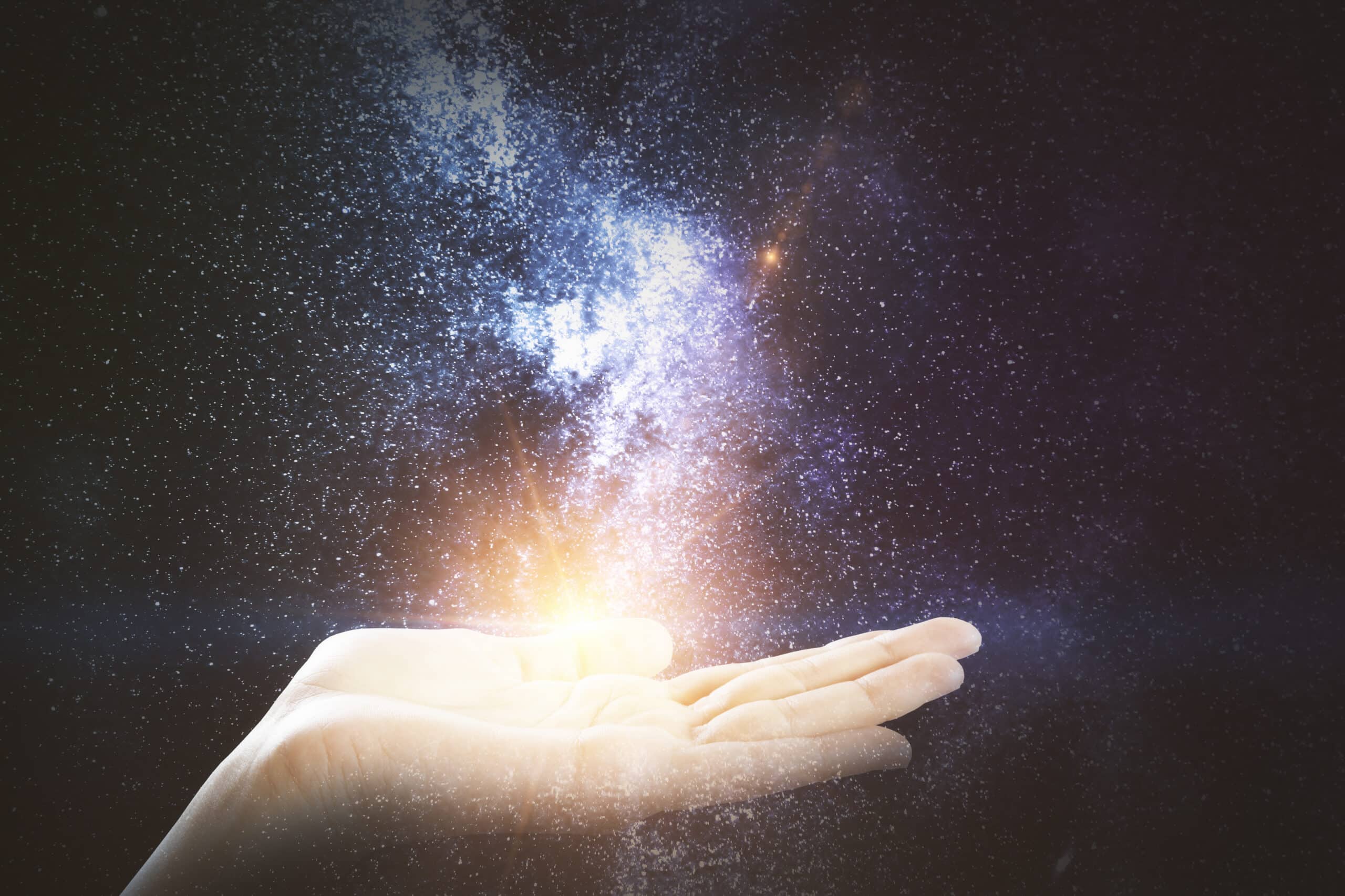 female-hand-holding-abstract-space-milky-way-fant